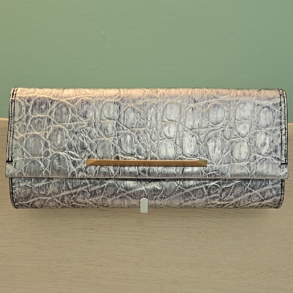 Brian Atwood Luxurious Silver Textured Clutch with Metallic Closure